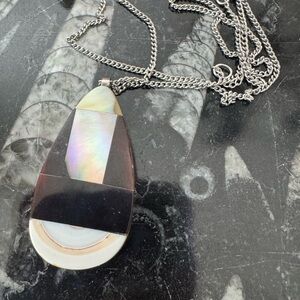 Iridescent Pendant Necklace. Mother of a pearl inlay and petrified wood.